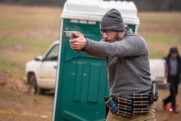 Johnathan Dierking shooting his Venom Custom build at a match
